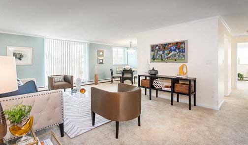 a living room with a couch and a table