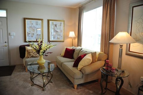 a living room with a couch and a table