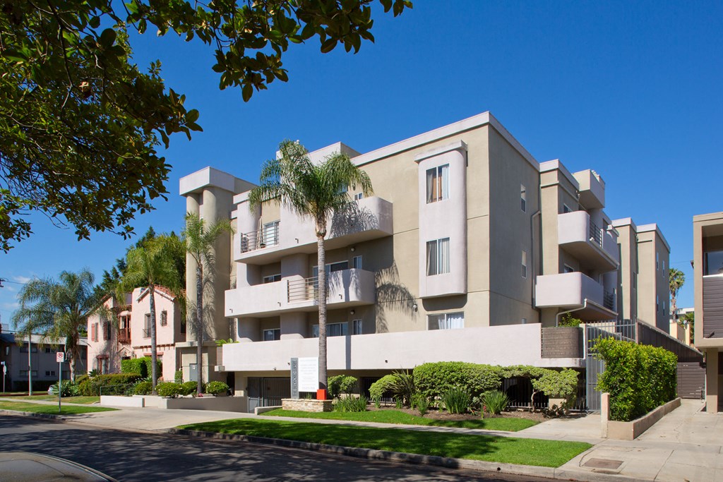 A cityscape with buildings and a clear sky.