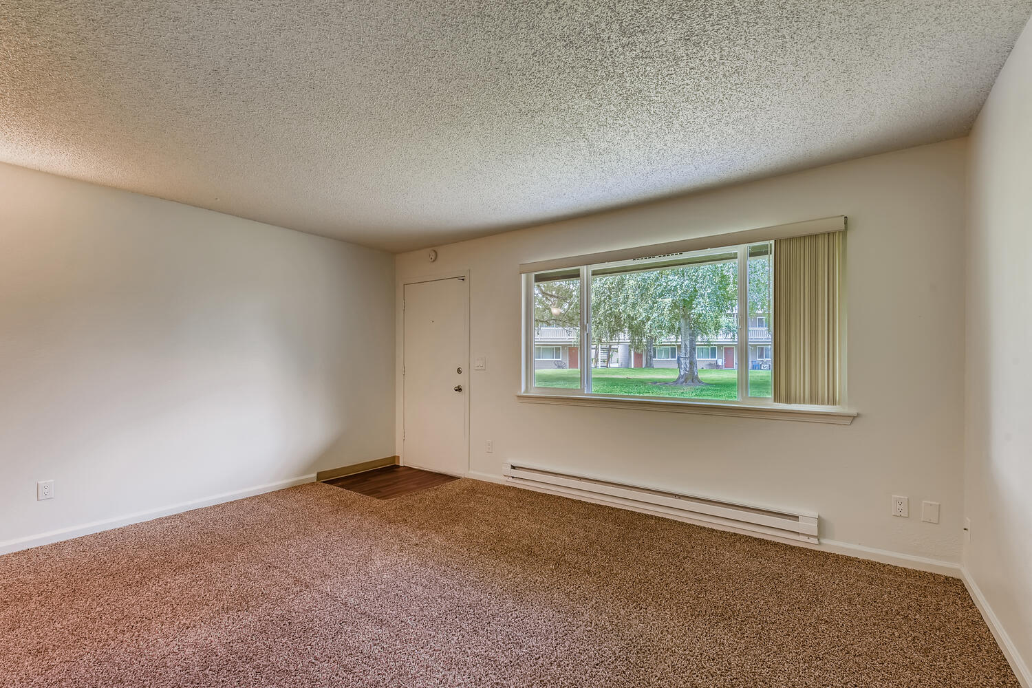 The Living Room in a One Bedroom Apartment at Morningtree Park Apartments