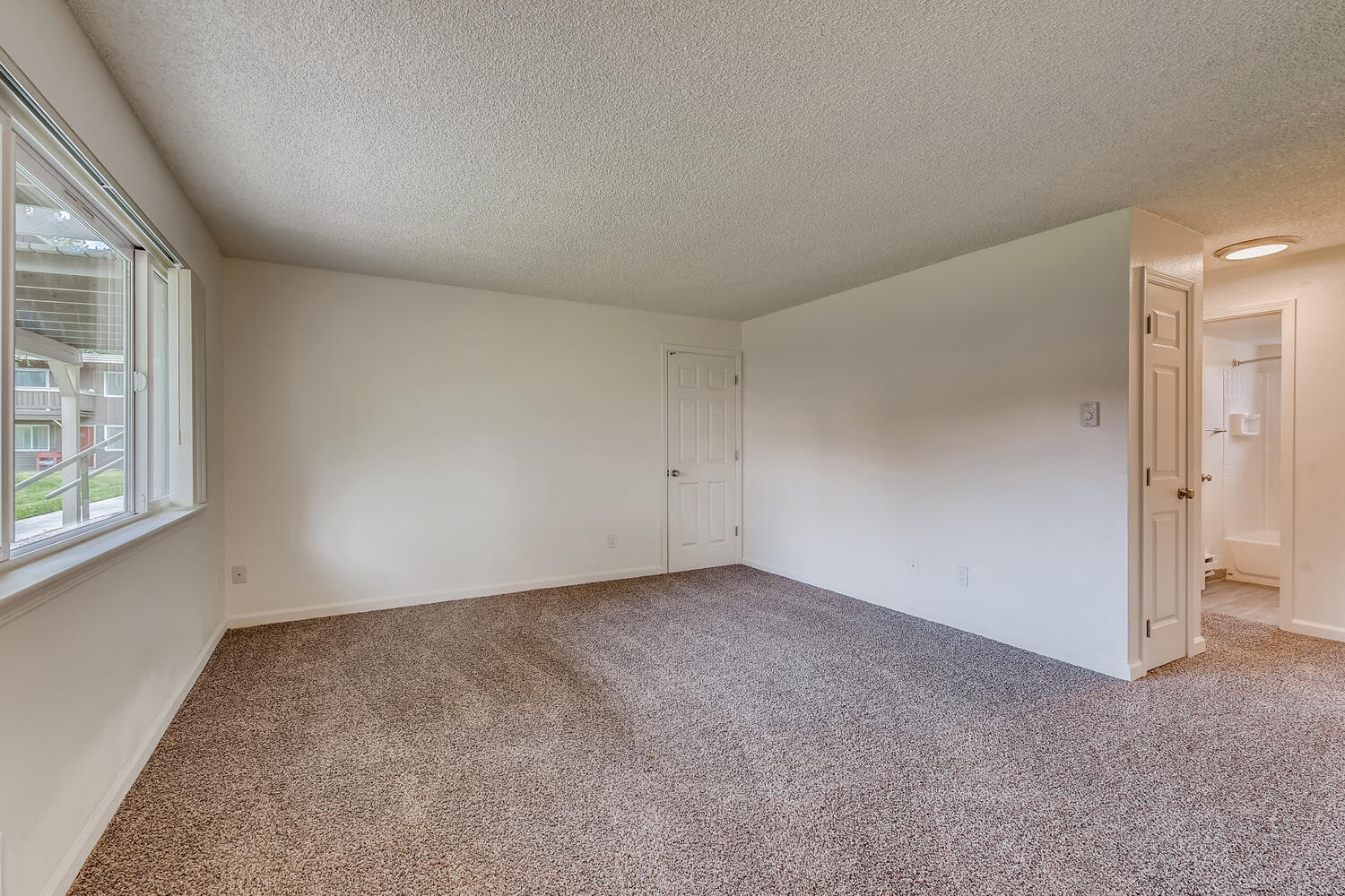 A Standard Living Room at Morningtree Park Apartments