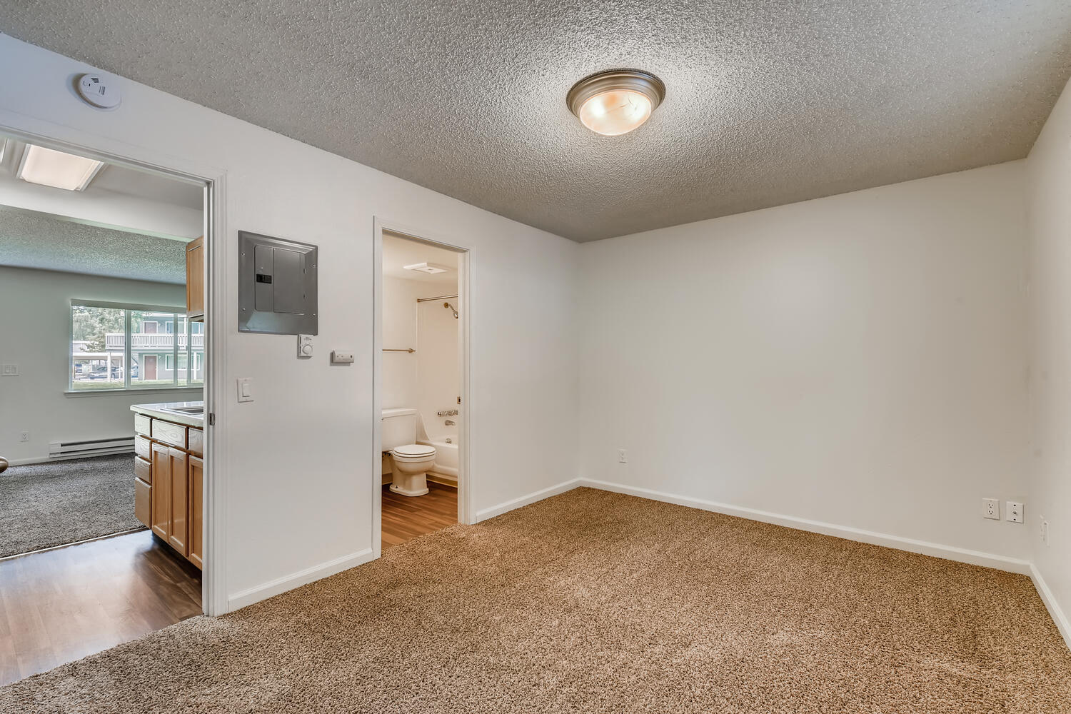 The Bedroom and Bathroom in a One Bedroom Apartment at Morningtree Park Apartments