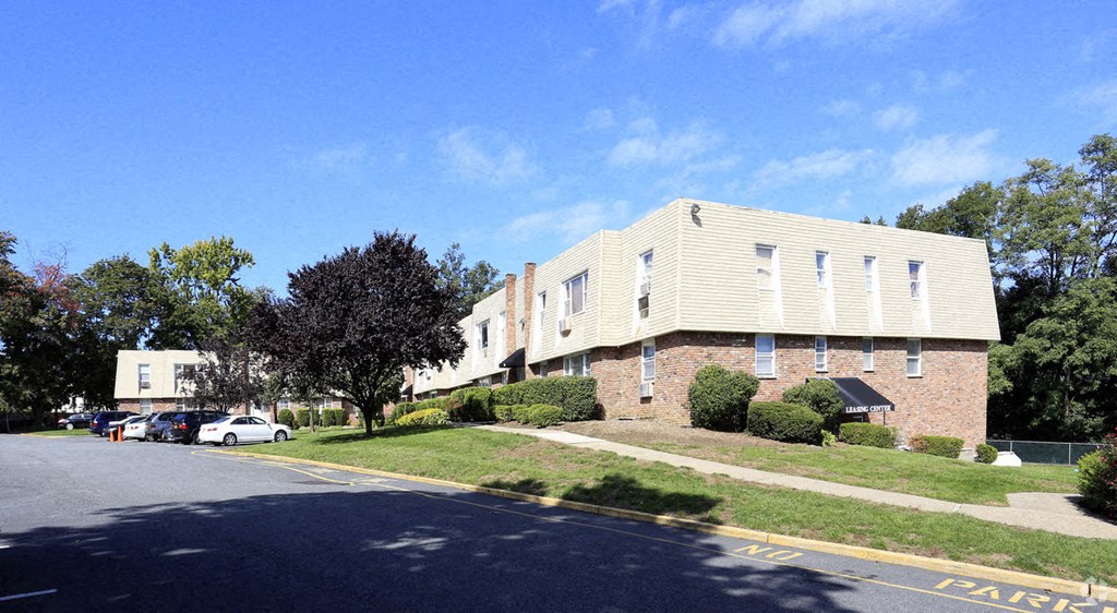 an apartment building on the side of a street
