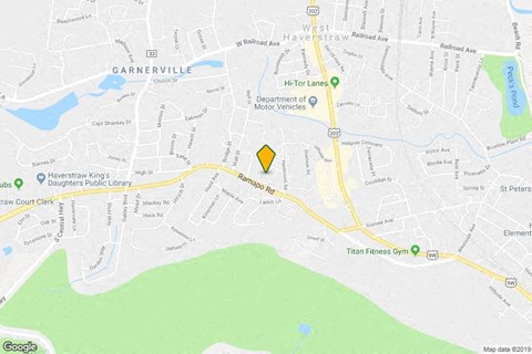 a map of a city with a yellow arrow on it
