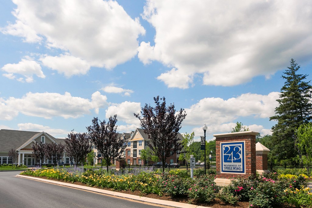 the boulevard at 2850 sign with apartments in the background