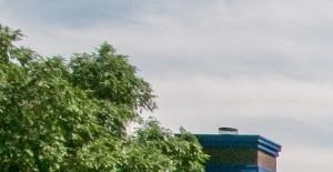 a large swimming pool in front of a house