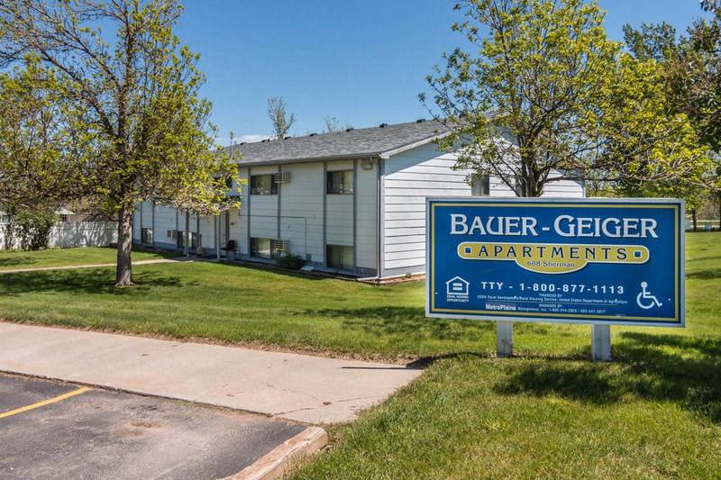 a building with a sign in front of it