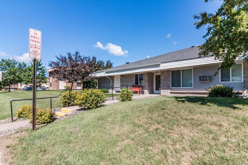 a house with a no parking sign in front of it