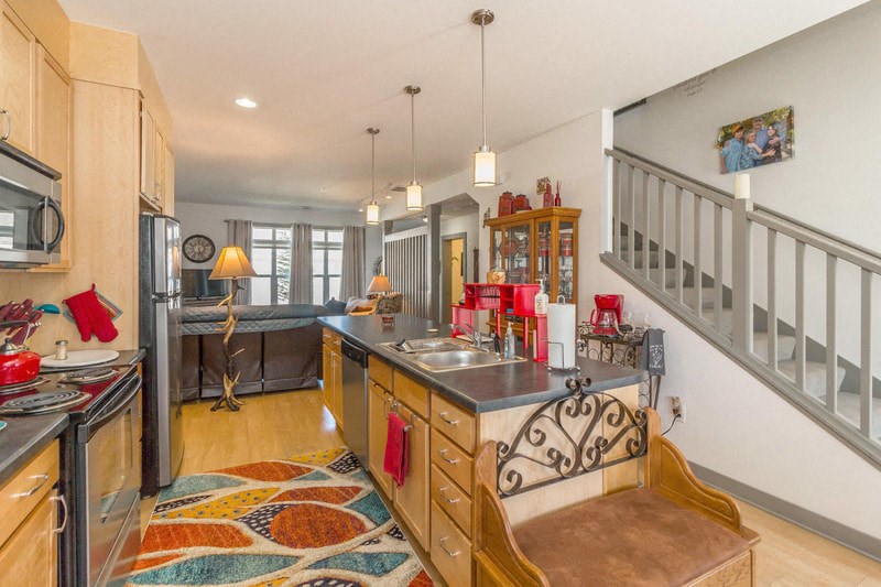 a kitchen with a counter top and a sink
