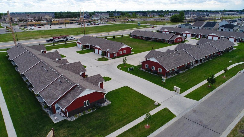 an aerial view of several houses in a neighborhood