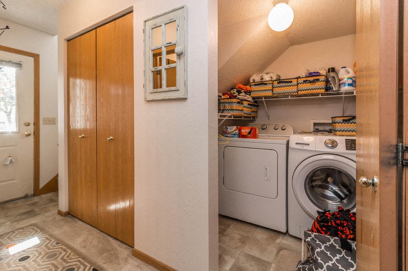 the laundry room has a washer and dryer in it