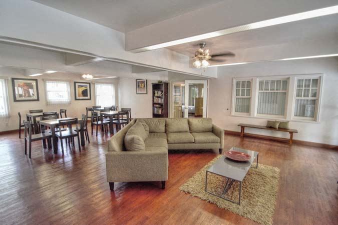 a living room with a couch and a table