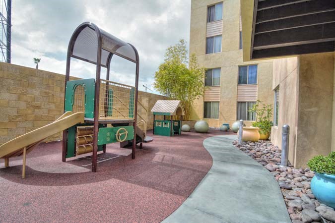 a childrens play area outside of a building