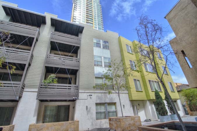 a group of buildings with different colors on them