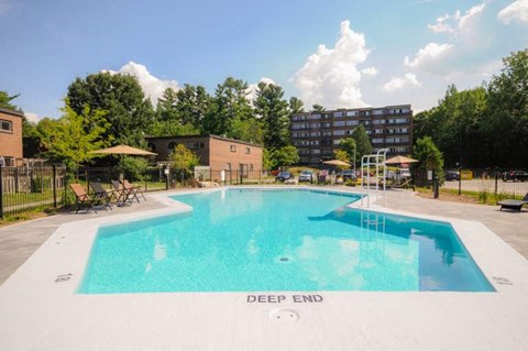 A swimming pool with the words "DEEP END" written on the side.