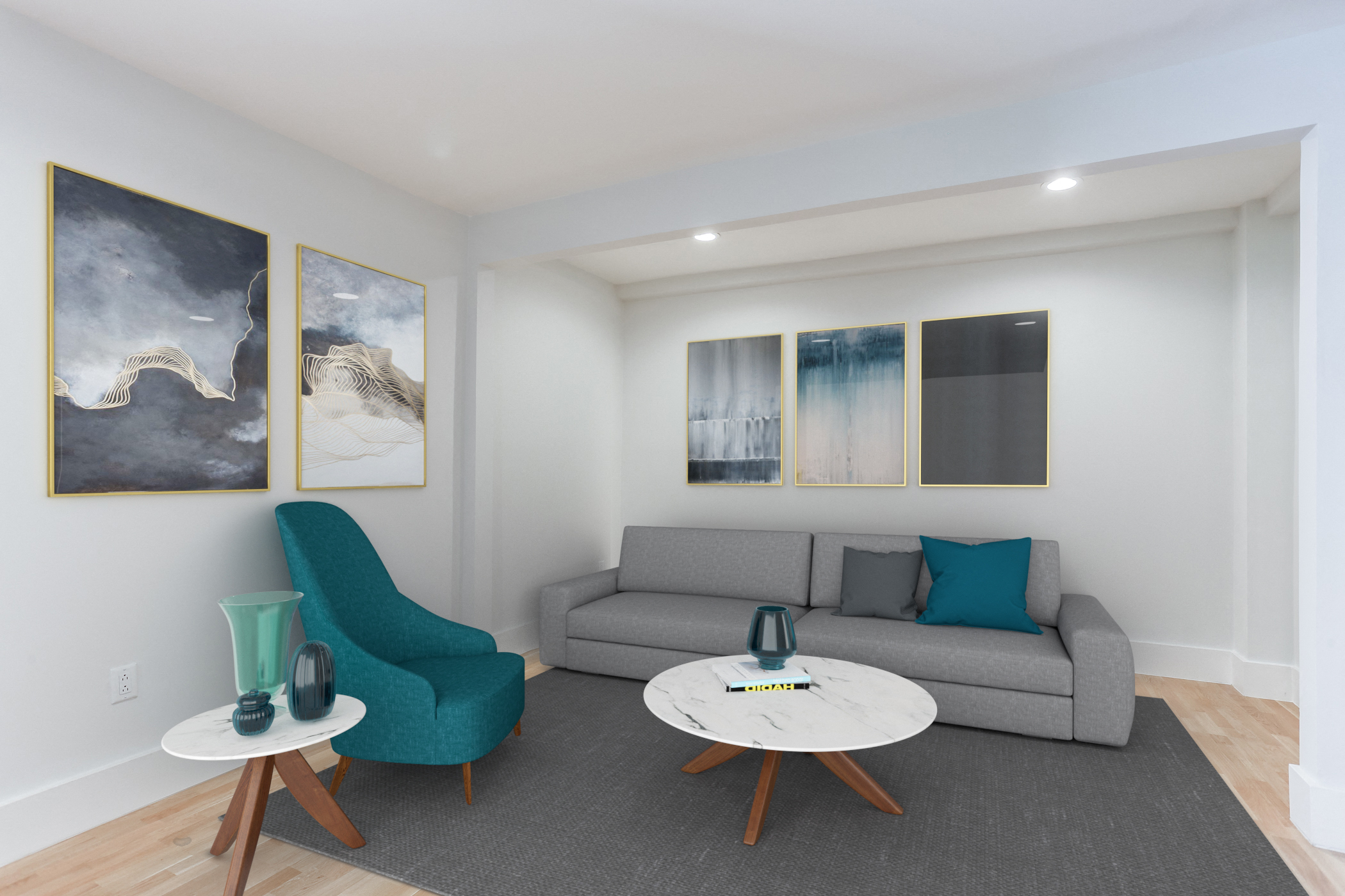 a living room with a gray couch and two blue chairs