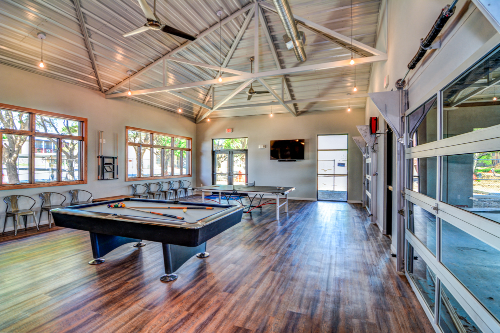 Clubhouse Game Room at Aviator at Brooks Apartments, Clear Property Management, San Antonio