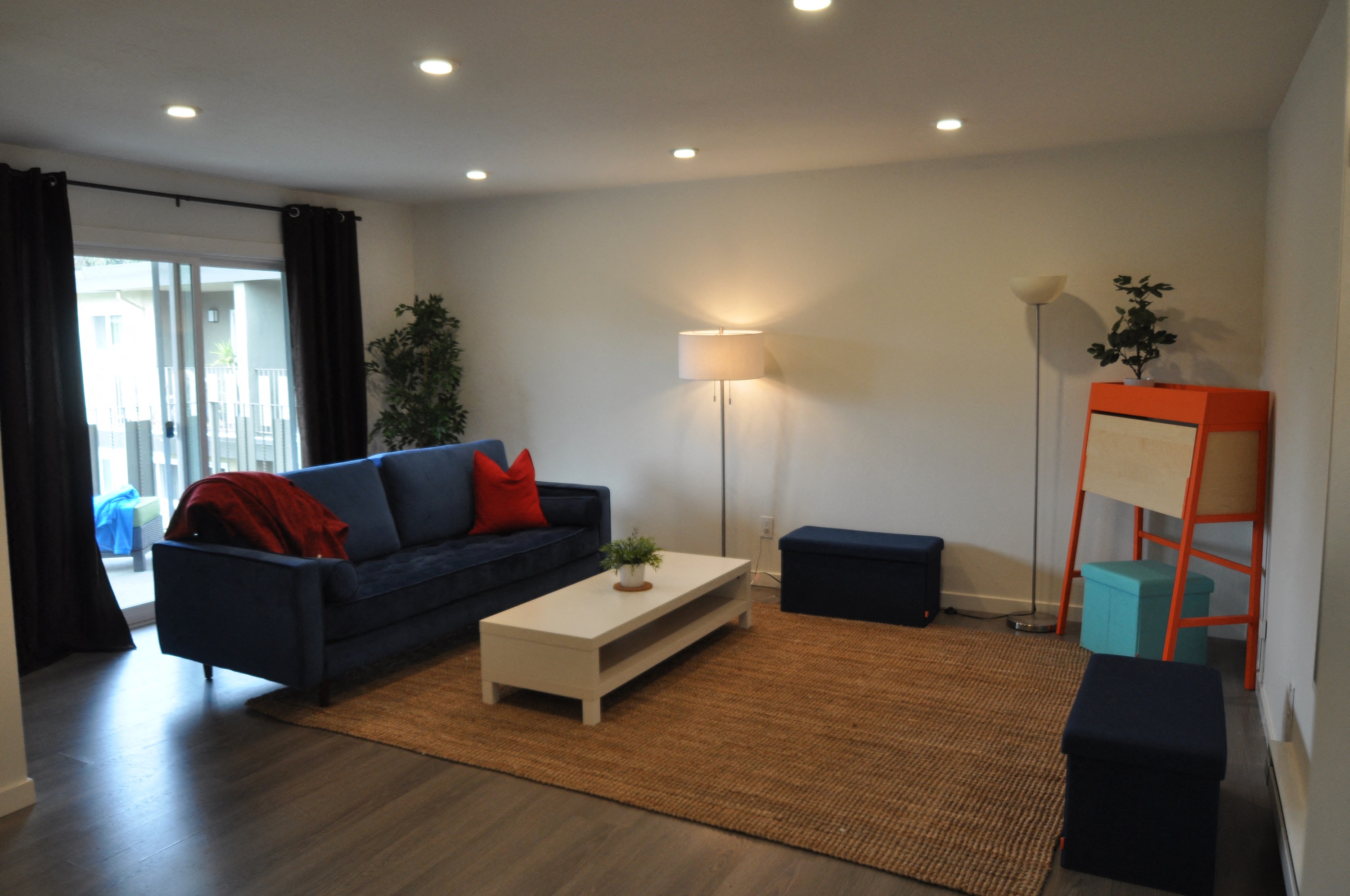 a living room with a couch and a coffee table