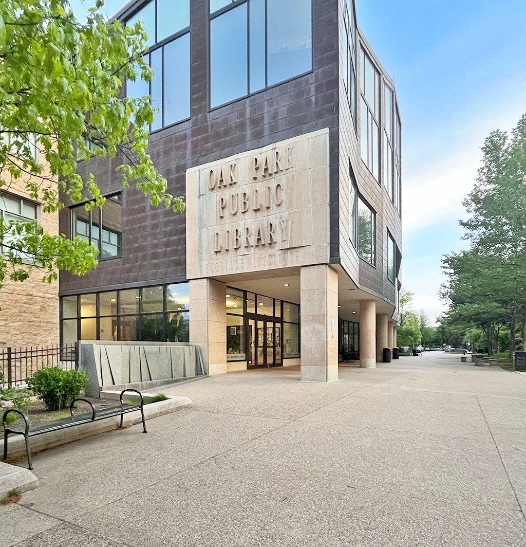 The Oak Park Public Library is a modern building with a glass facade and a stone entrance.