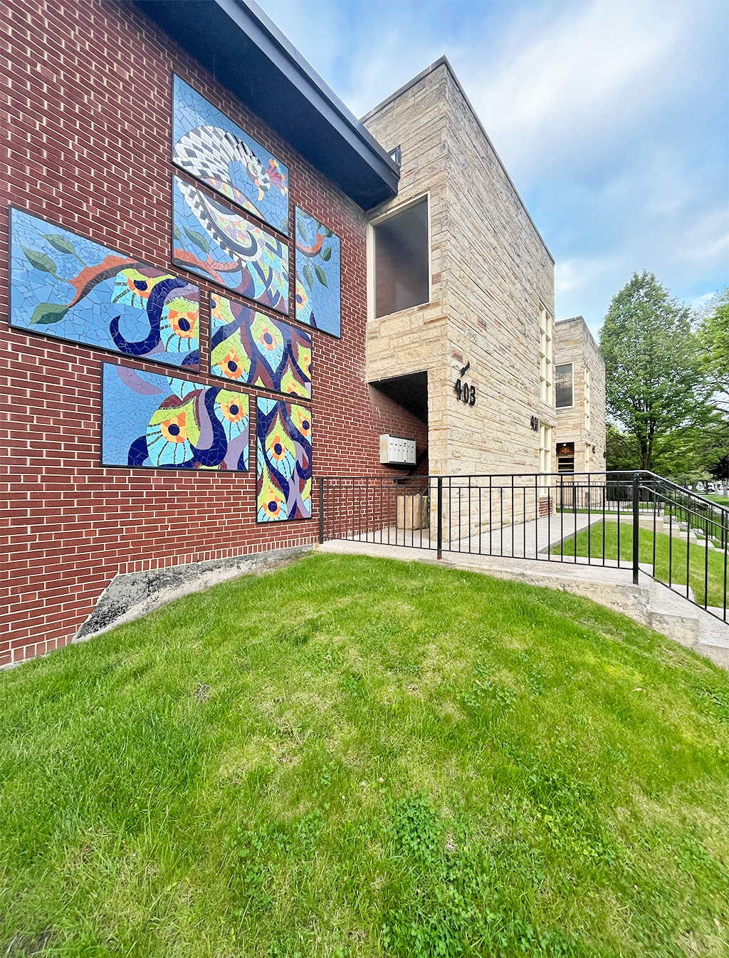 A building with a mural of flowers on the side.
