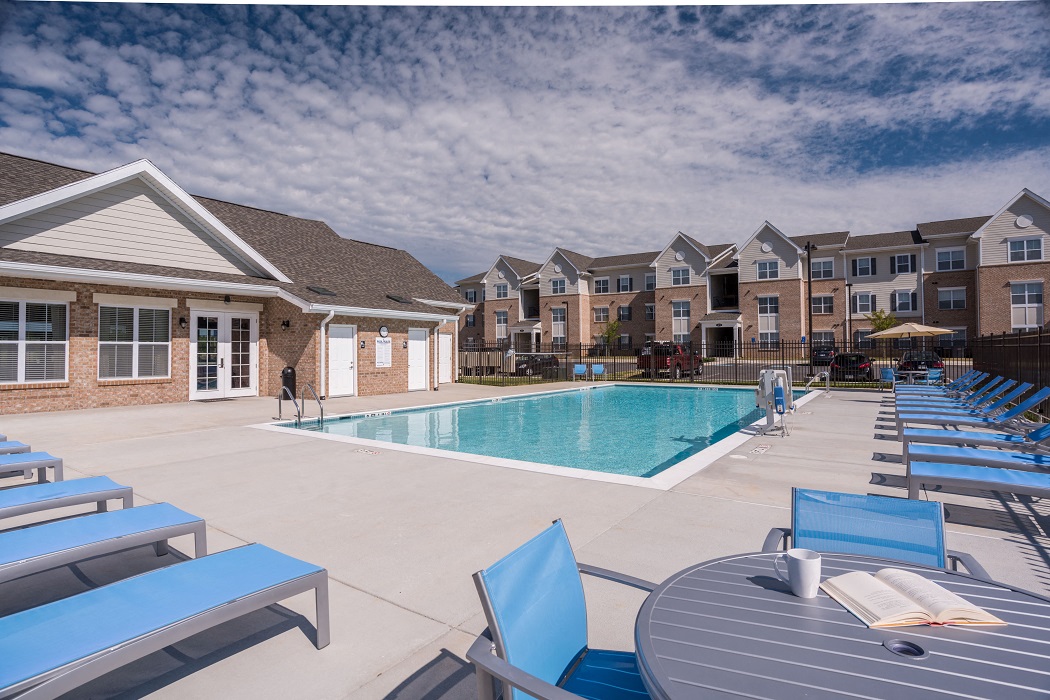 our apartments have a large pool and lounge chairs