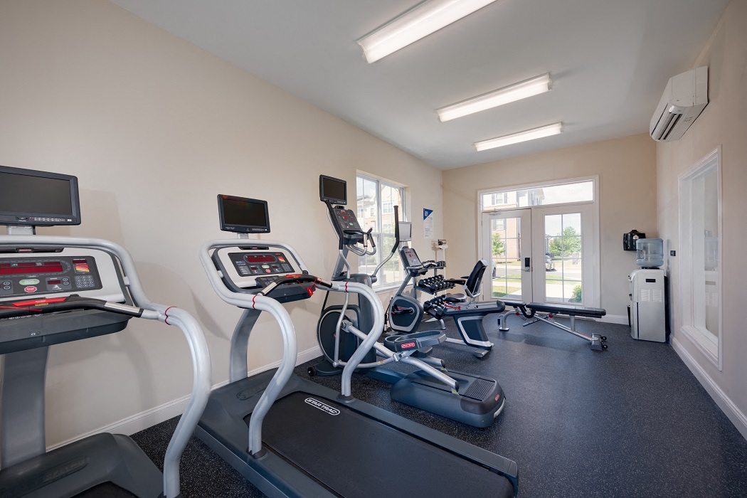 the gym has cardio equipment and yoga machines