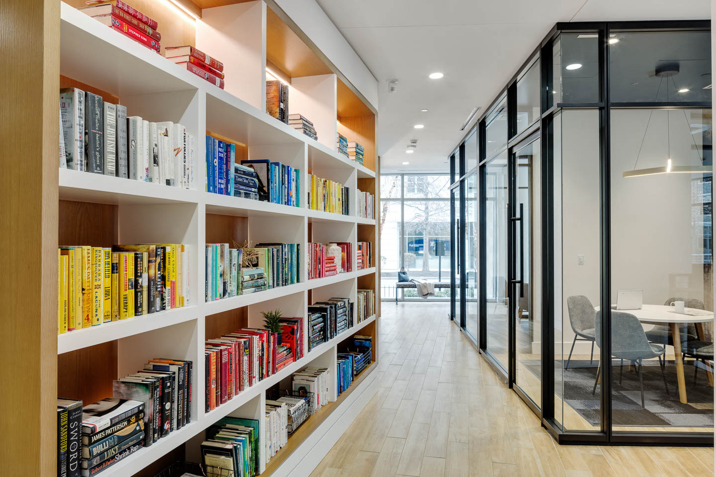 a book shelf in a library with books on it