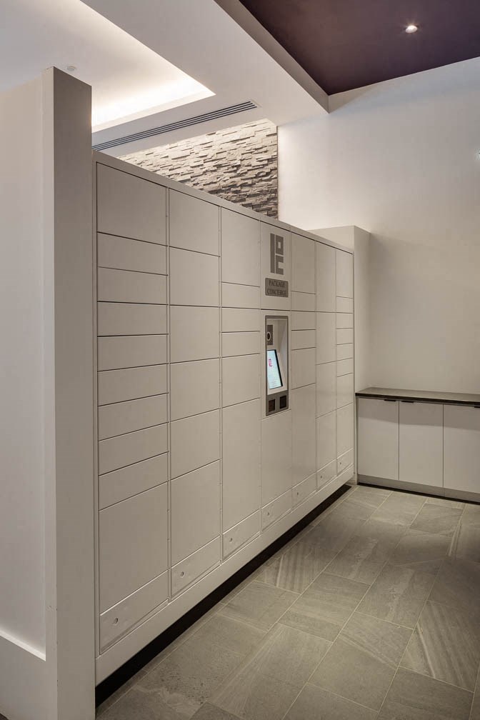 a row of white lockers in a room