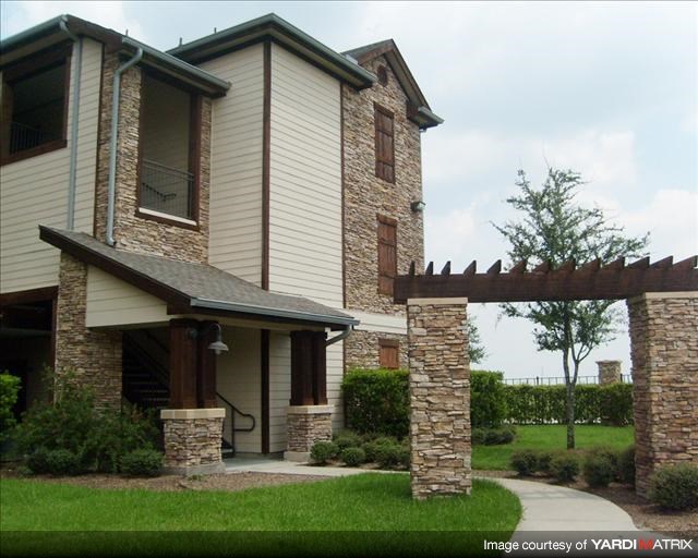 a house with a walkway in front of it