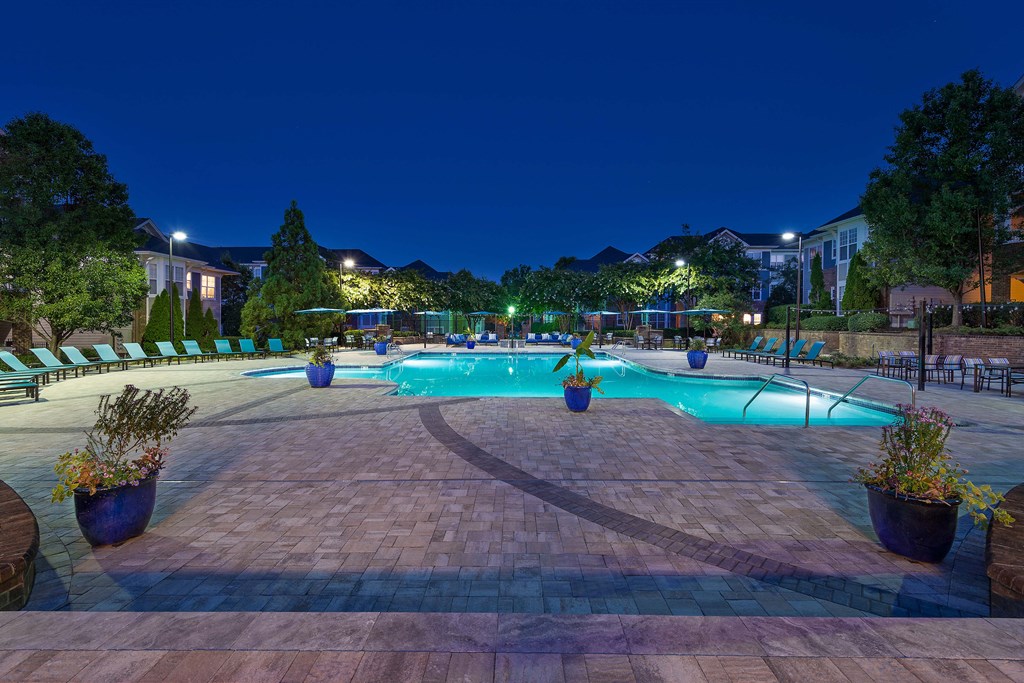 a swimming pool at night at the resort at night