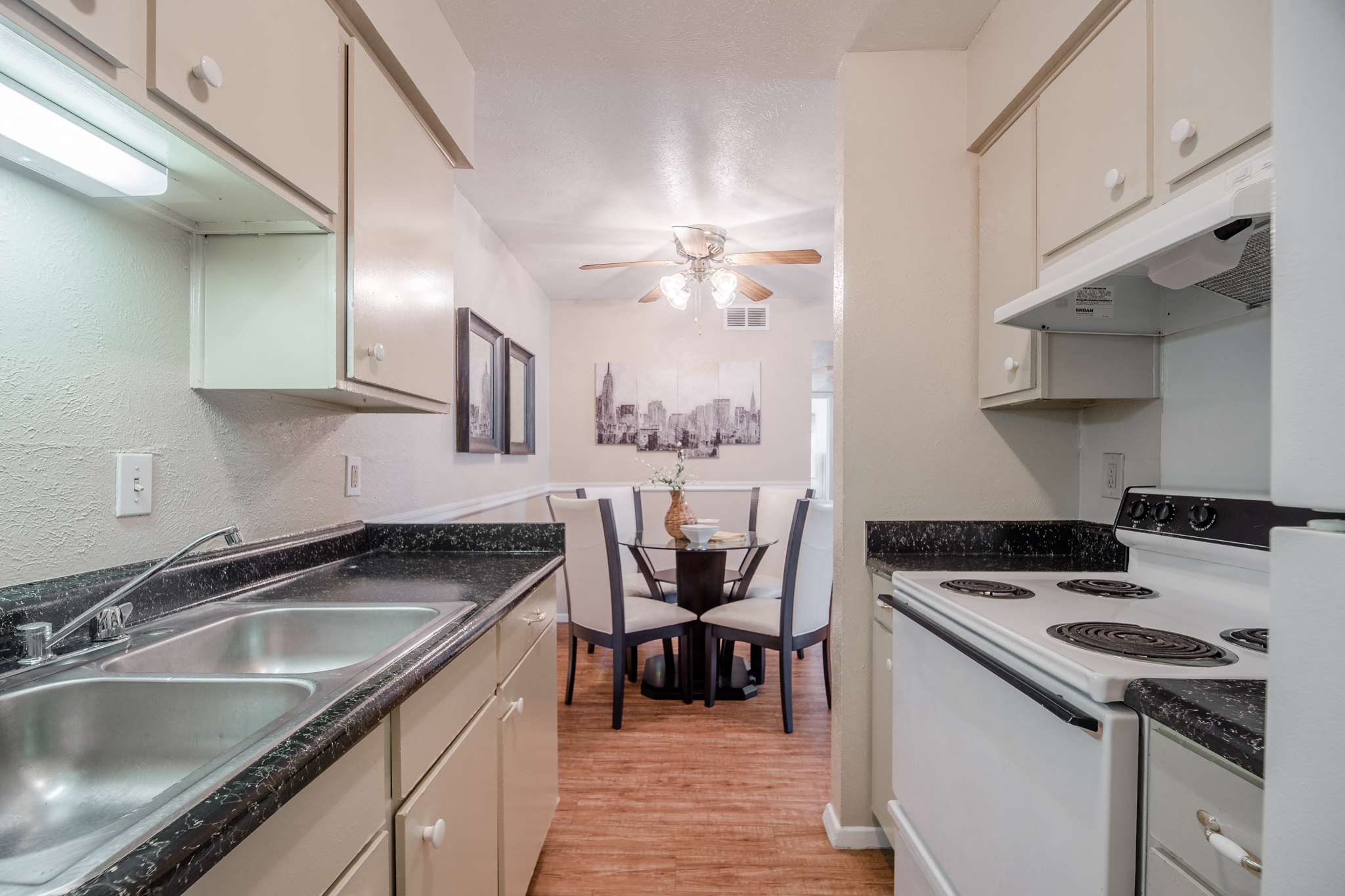 Galley-style kitchen at Garden Park, Irving, 75062