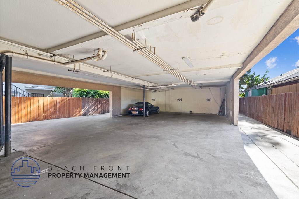 a parking garage with a car parked in it