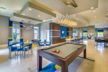 Game Room with Billiard Table and Flat Screen TVs