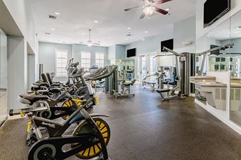 Fitness Center with Yoga Studio, Spin Bikes and Cardio Equipment