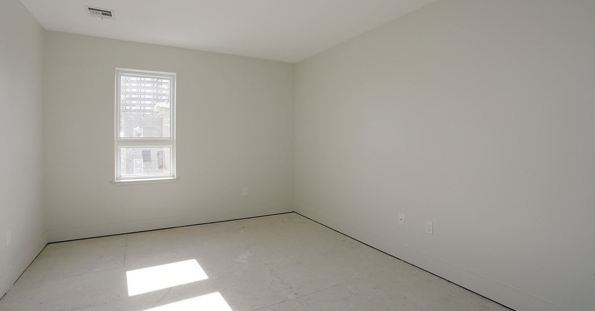 bedroom with white walls