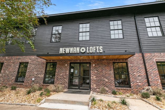 a building with a sign on the front of it