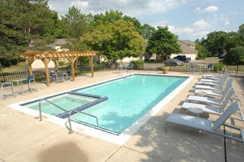 Pool, spa and sundeck area surrounded by luxe landscaping and relaxation zone.