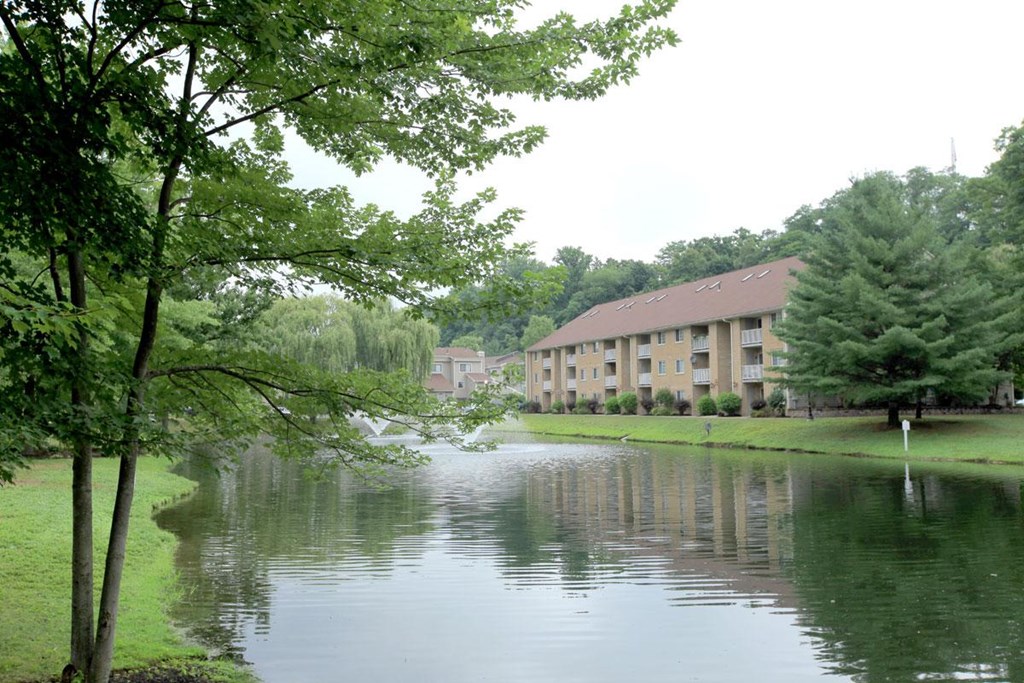 a river with a building on the side of it