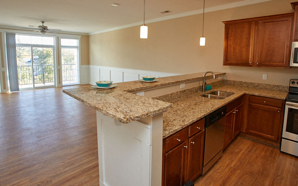 a kitchen with a counter top and a sink