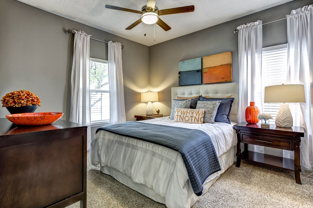 Upgraded Bedroom Upgraded model bedroom with 9 foot ceilings and ceiling fan