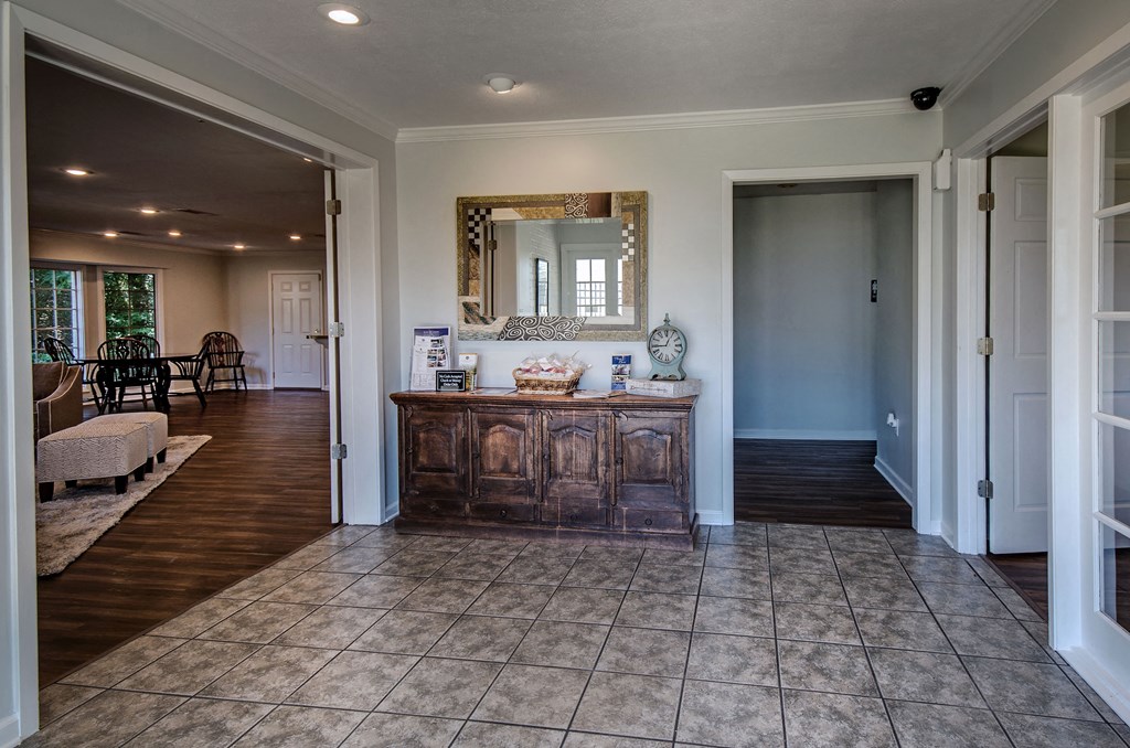a view of a living room from the entryway of a house