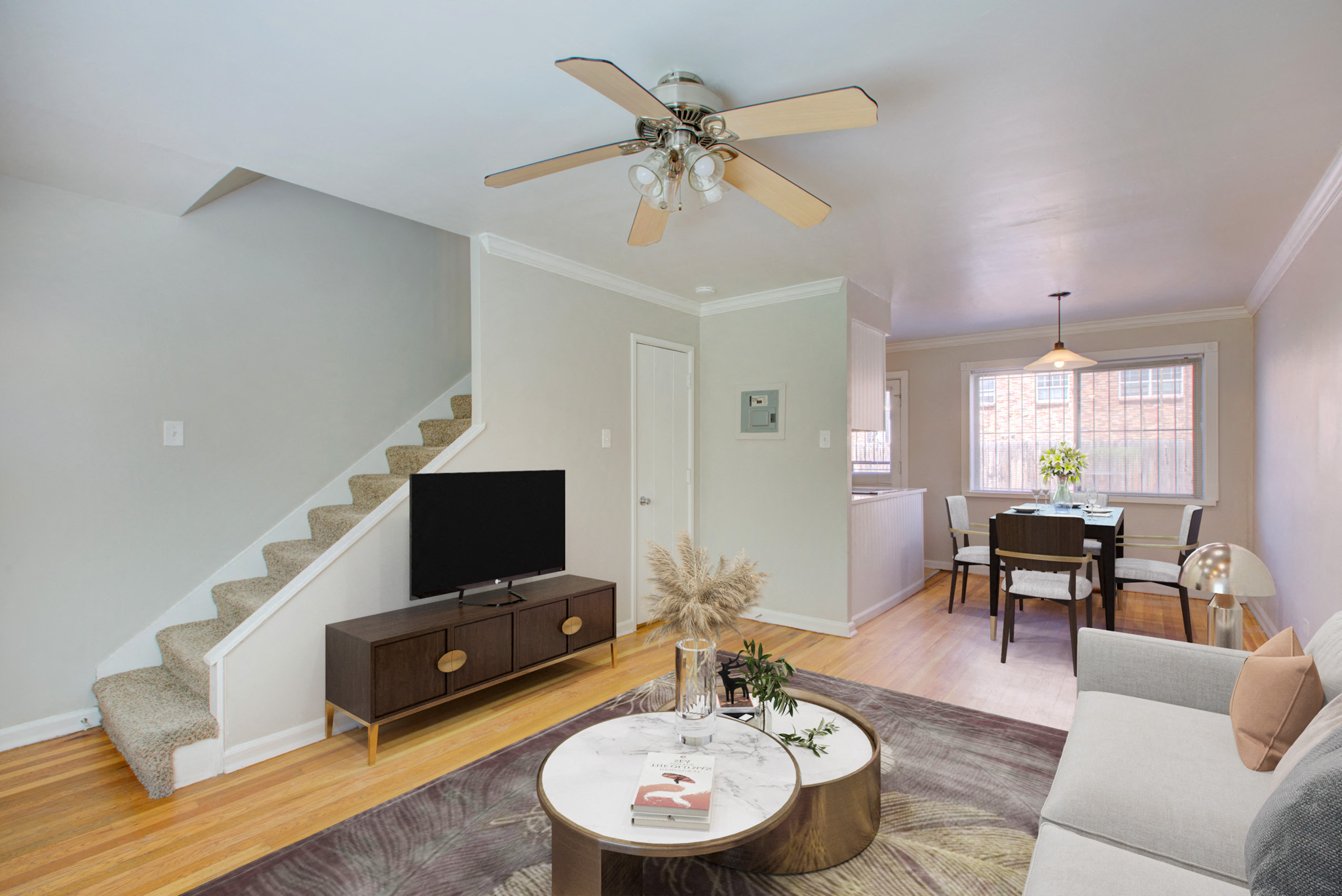 a living room with a couch and a tv