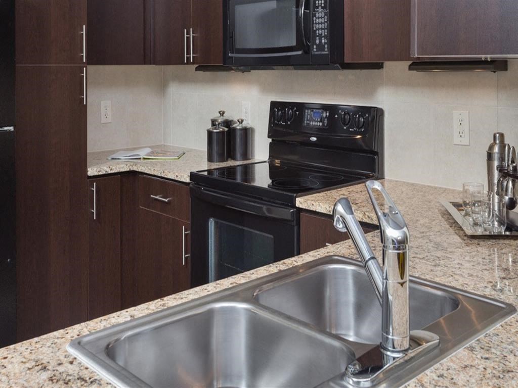 Sink With Faucet In Kitchen at The Core, Houston, Texas