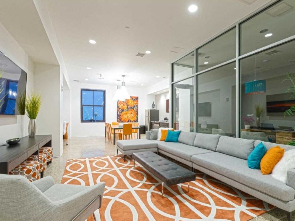 Leasing Office with seating area and modern decor at The Equitable Building, Des Moines, IA