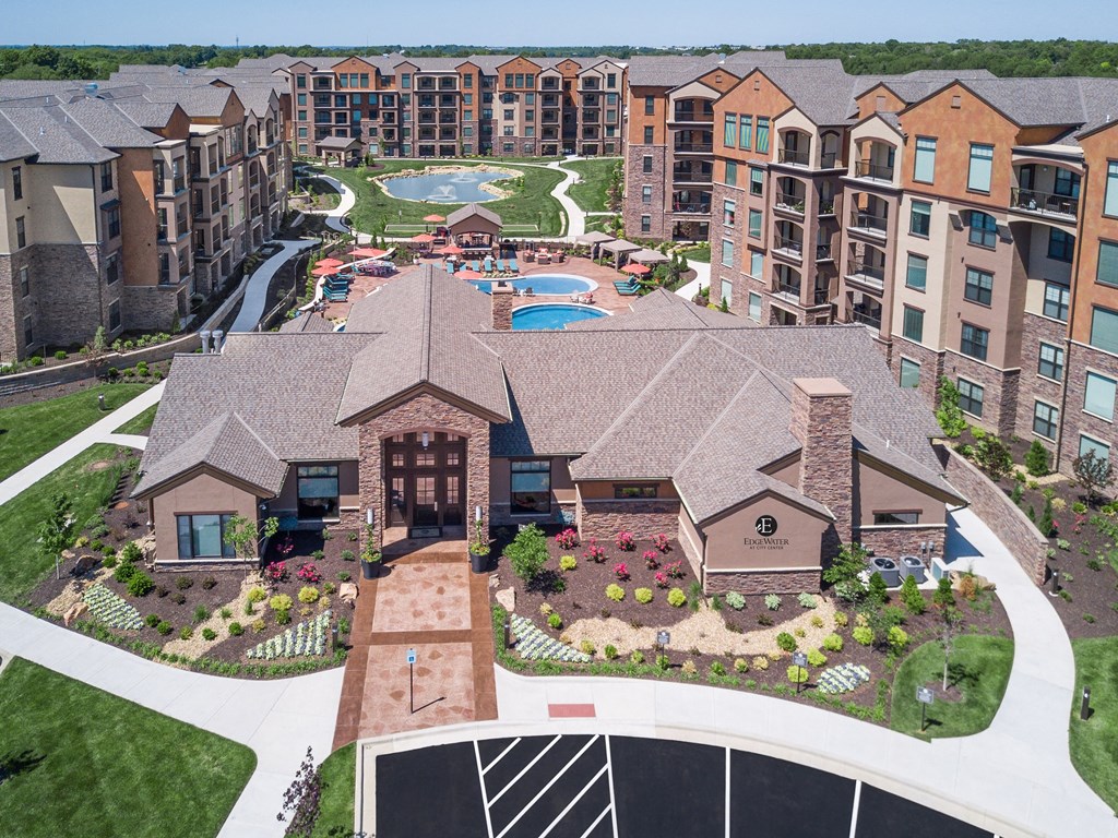 an aerial view of a large complex with a pool and landscaping  at EdgeWater at City Center, Lenexa, KS, 66219