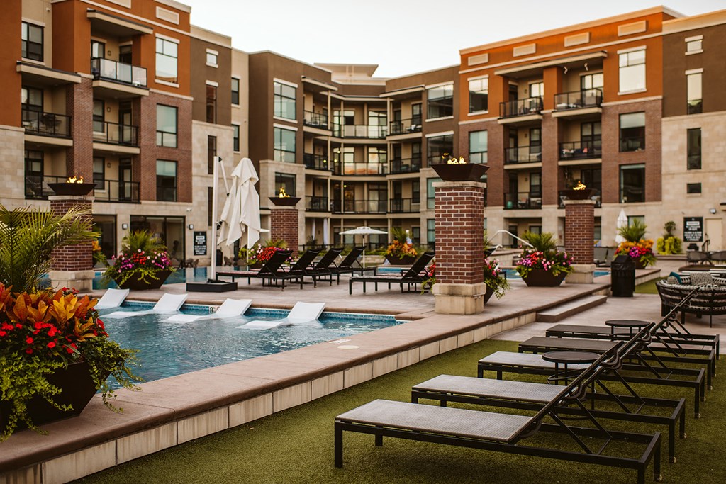 Pool Side Relaxing Area With Sundeck at The Royale at CityPlace, Overland Park, Kansas