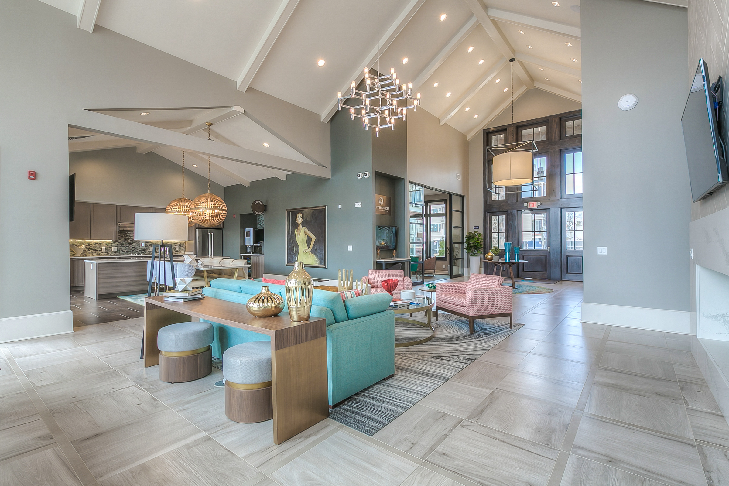 Apartments for Rent in Lenexa-Waterside Residences at Quivira Apartments Kitchen With Hardwood Flooring And Dark Wooden Cabinetry And Stainless Appliances  at Waterside Residences on Quivira, Lenexa,