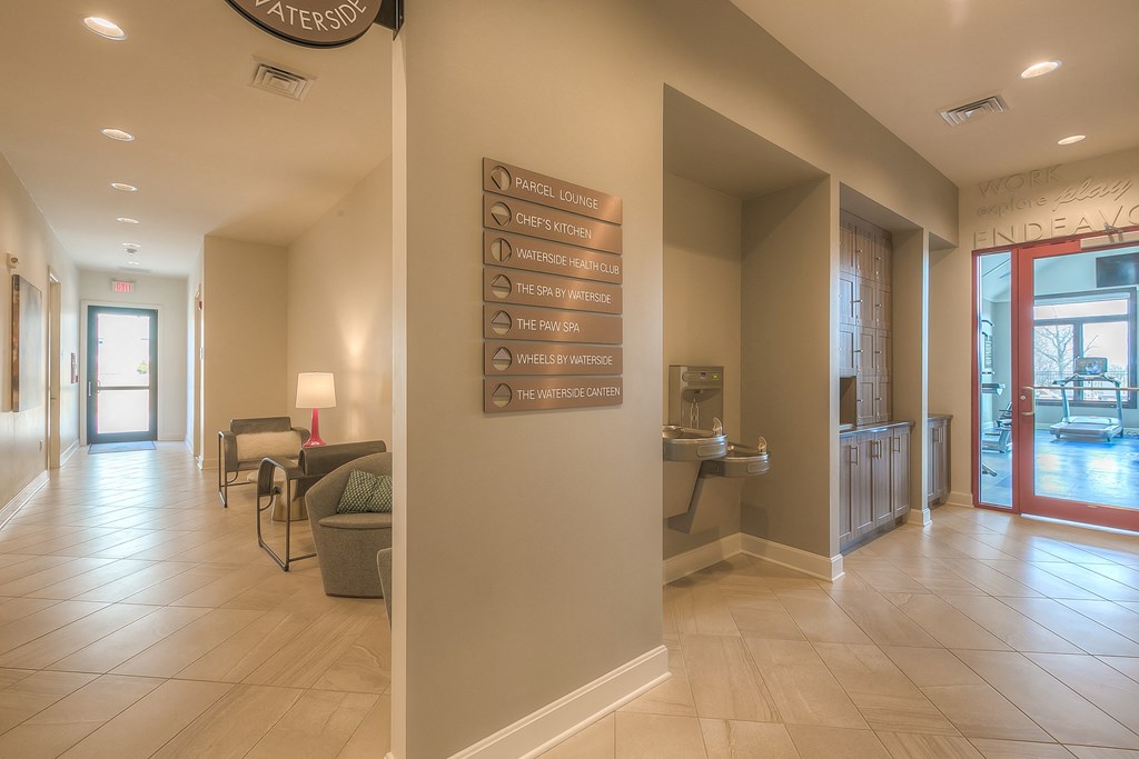 a hallway to the gym and other amenities  at Waterside Residences on Quivira, Kansas, 66215