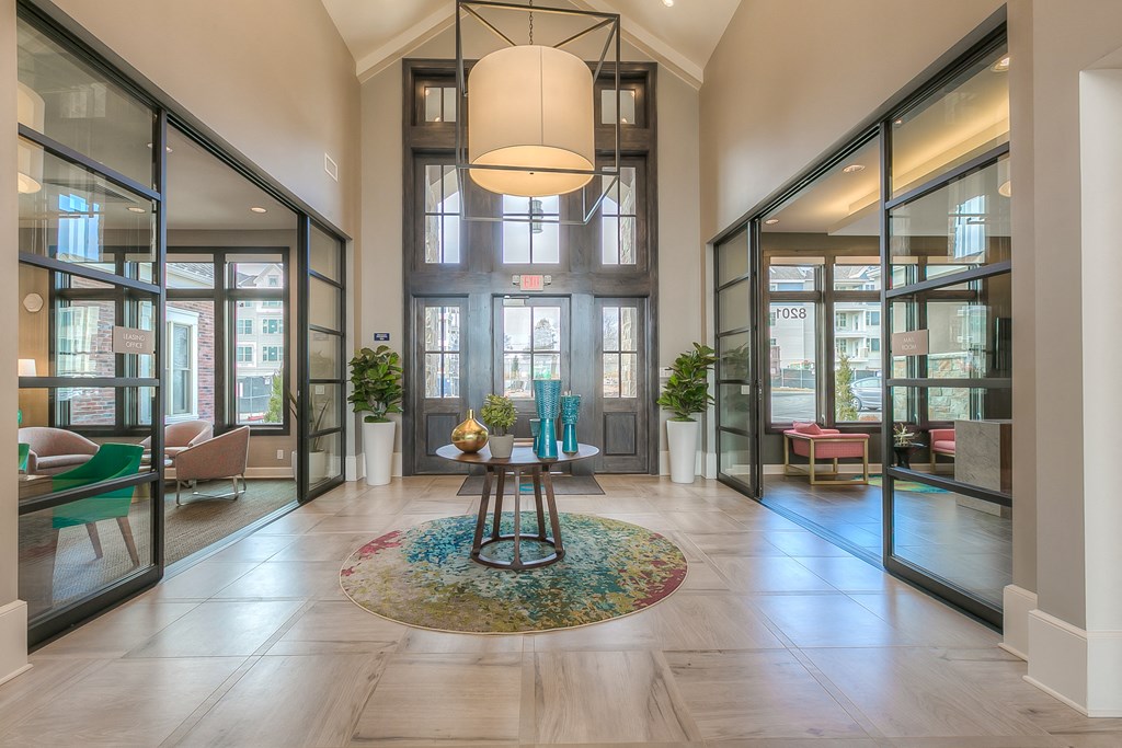 clubhouse entrance with access to the leasing office and the mailroom  at Waterside Residences on Quivira, Lenexa