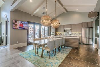 Community Kitchen with Dining Table and Serving Area